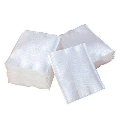 Il cotone facciale puro organico compone i cuscinetti del dispositivo di rimozione per cura di pelle quotidiana