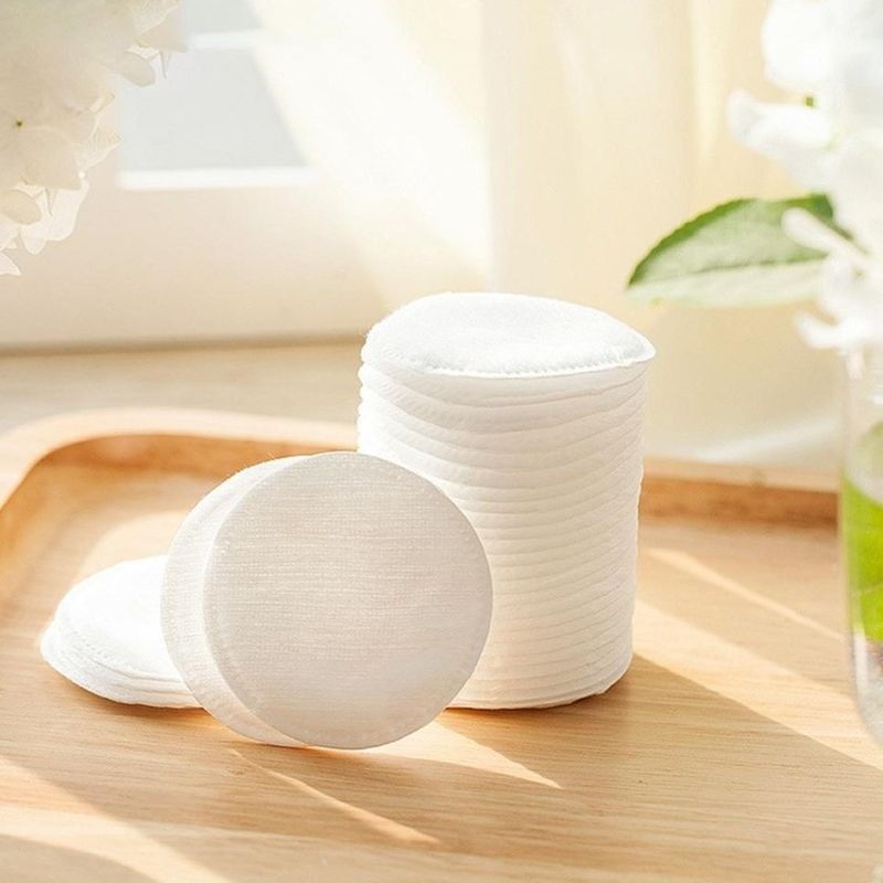 Il fronte organico molle bianco puro del cotone riempie l'alto assorbimento per uso cosmetico